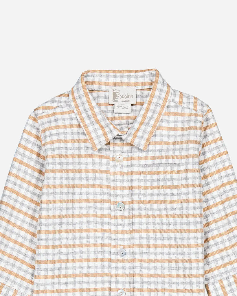 Zoom de la chemise bébé à carreaux beige et gris en coton de la marque Bobine Paris