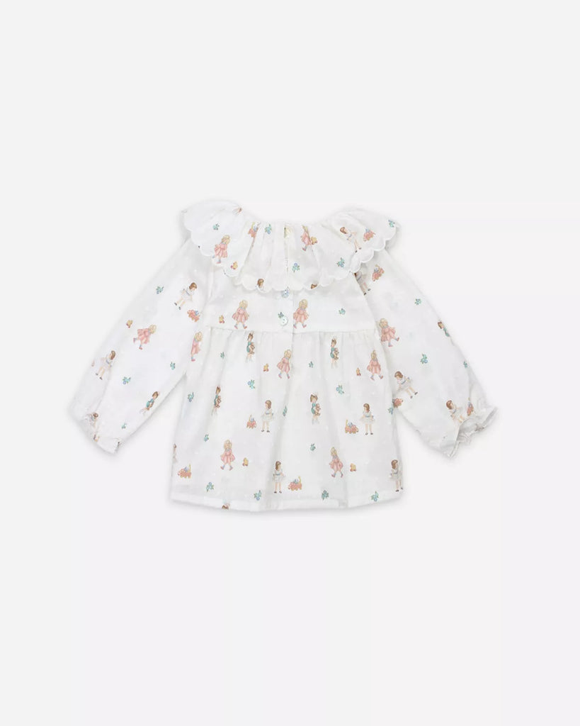 Vue de dos de la blouse pour bébé fille à imprimé poupées de la marque Bobine Paris.