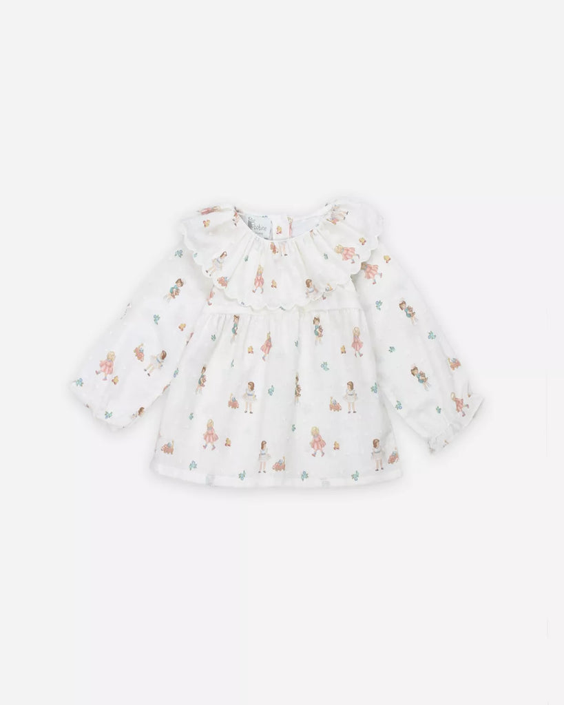 Blouse pour bébé fille à imprimé poupées de la marque Bobine Paris.