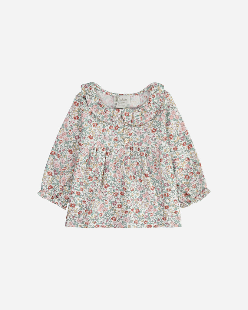 Blouse Ava fleurs émeraude et rose avec un col claudine.