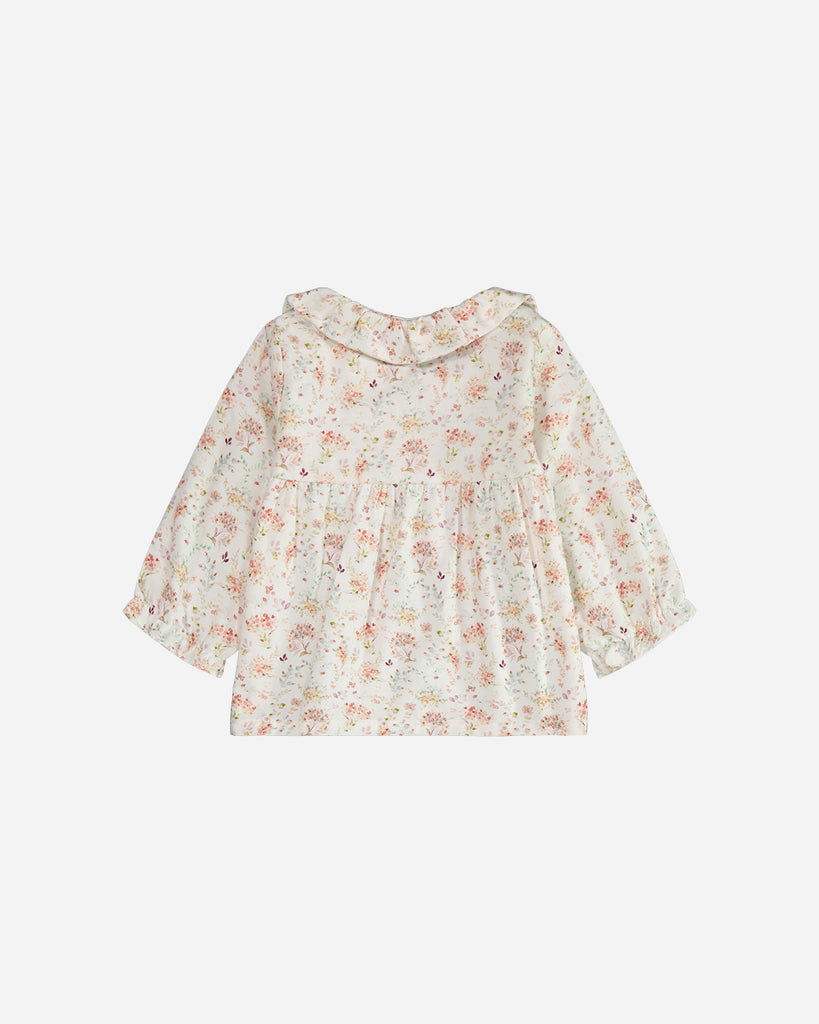 Blouse manches longues Ava blanc fleurs rosées avec un col claudine vue de dos.