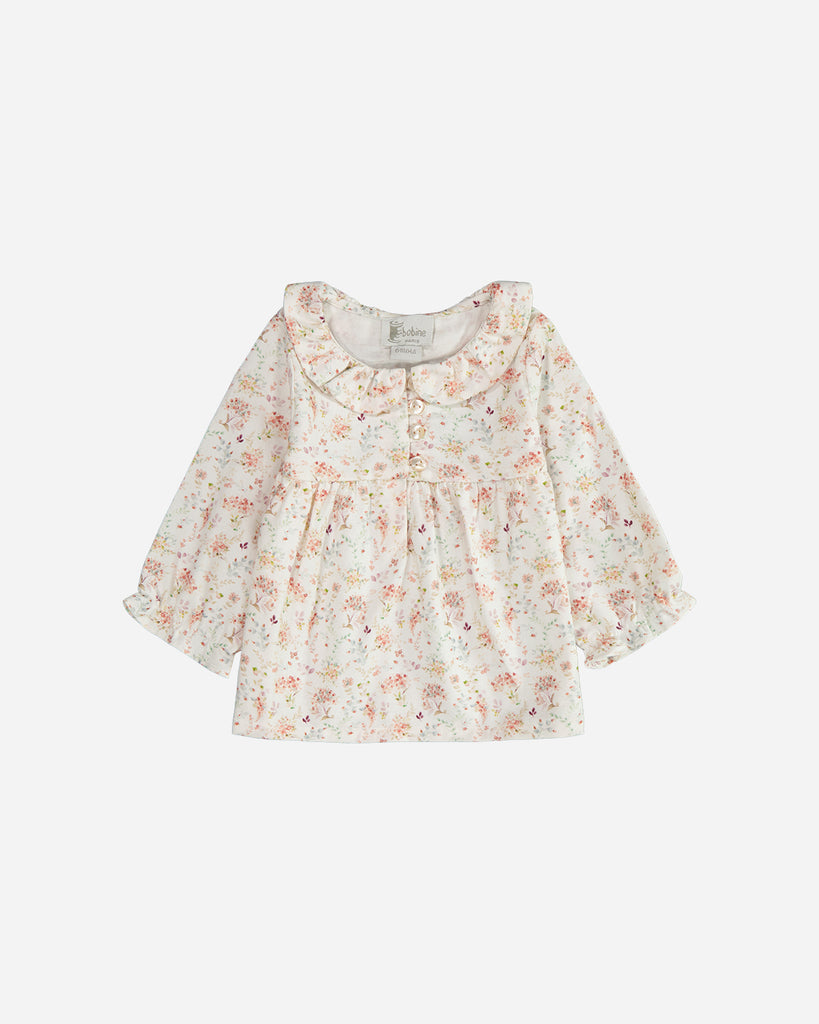 Blouse manches longues Ava blanc fleurs rosées avec un col claudine.