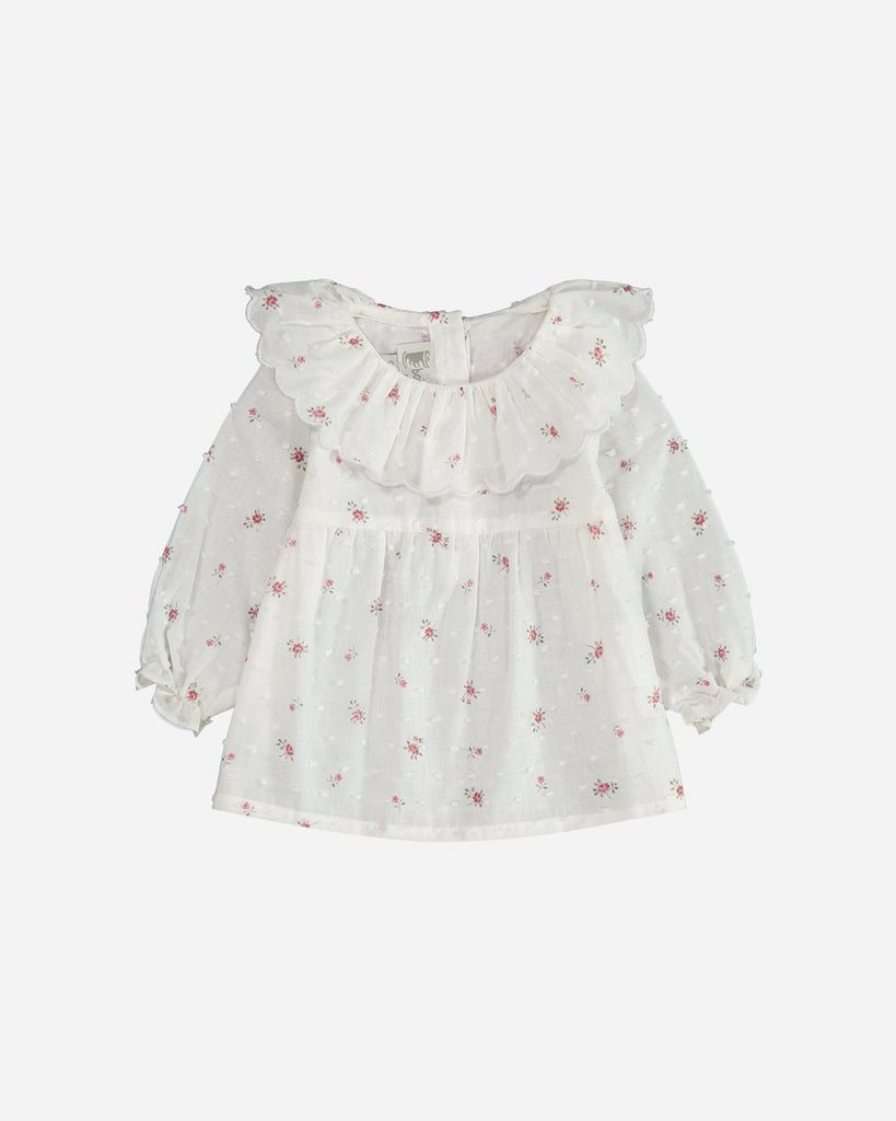 Blouse marguerite blanche manches longues plumetis fleuri.