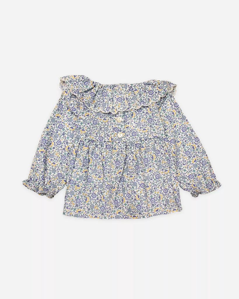 Vue de dos de la blouse pour bébé fille à col volanté et fleurs fleues de la marque Bobine paris.