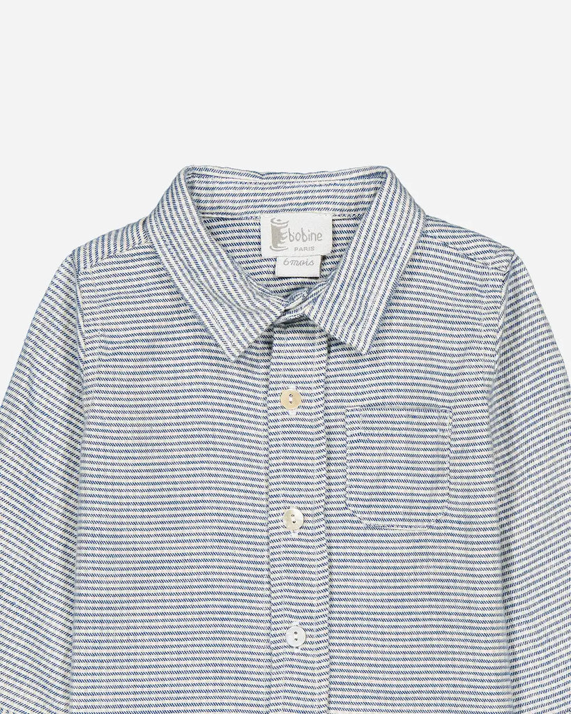 Zoom de la chemise bébé à petits carreaux bleu et gris de la marque Bobine Paris