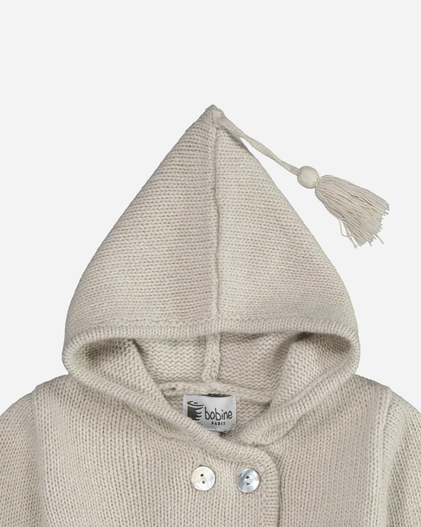 Veste bébé en laine et cachemire à capuche beige layette zoom face